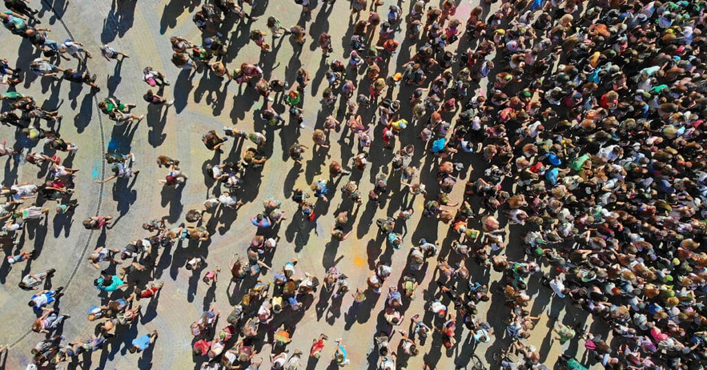 Aerial view of a crowd of people walking.