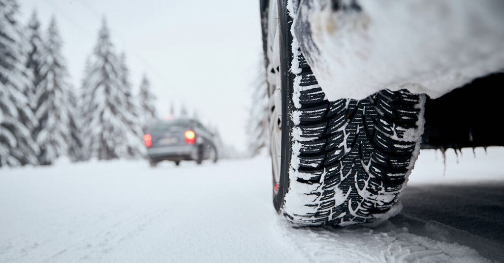 car wheel on a snowy road.