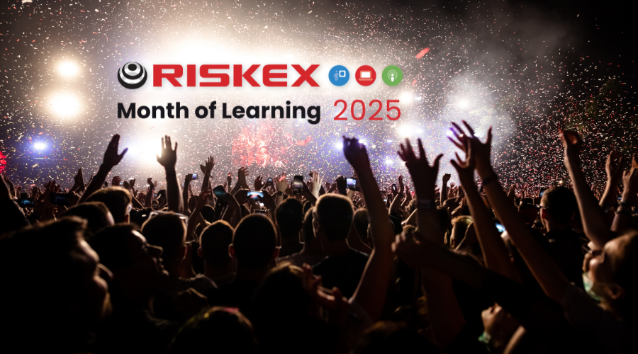 Crowd with their hands in the air at a live event.