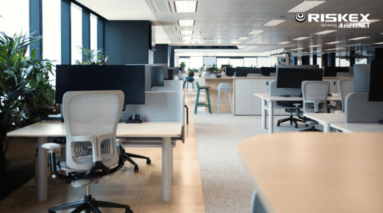 flexible office work space fitout with desks chairs and monitors.