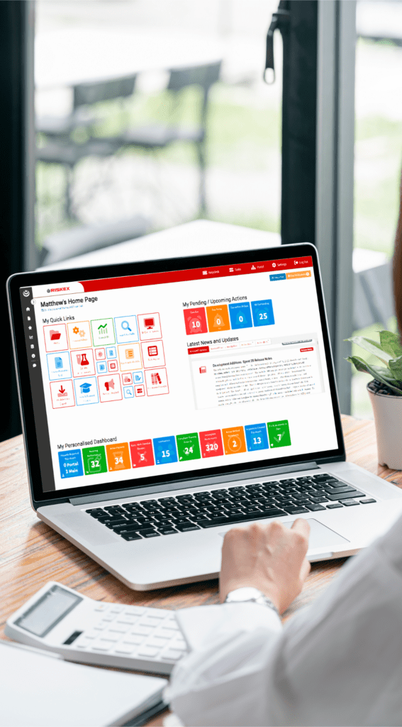 laptop display AssessNET's homepage dashboard.