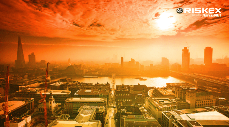 London skyline under extreme heat and orange skies during a heatwave, highlighting the growing impact of climate change on UK cities.