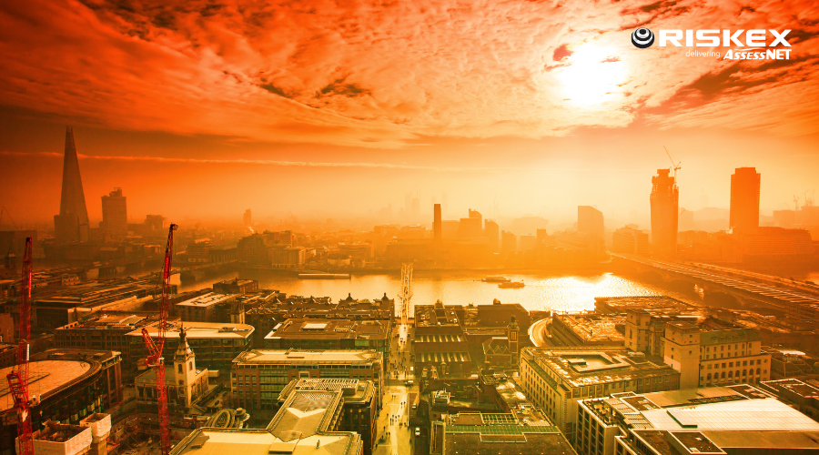 London skyline under extreme heat and orange skies during a heatwave, highlighting the growing impact of climate change on UK cities.